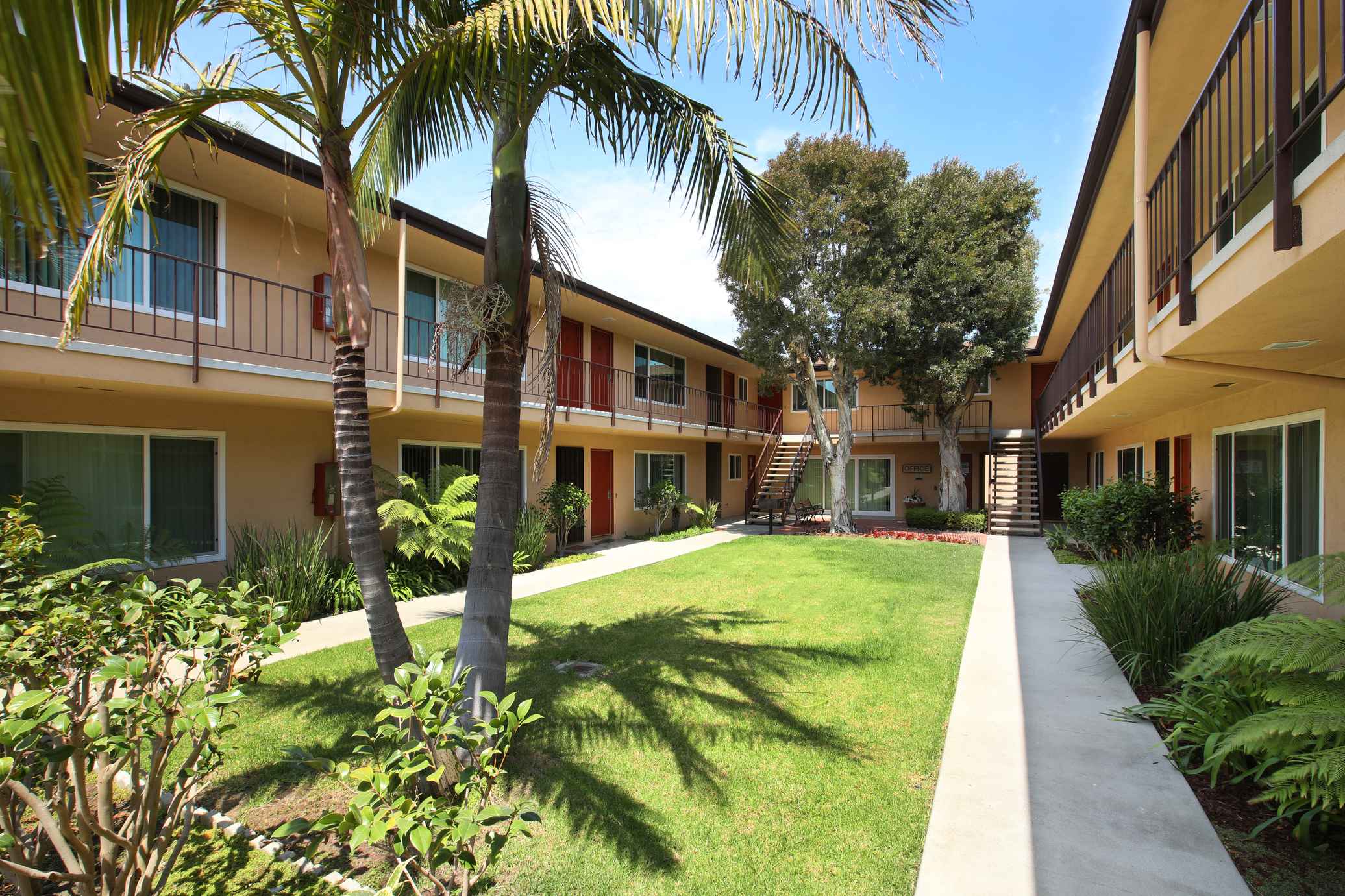Armada Apartments lush park-like setting with resident access paths