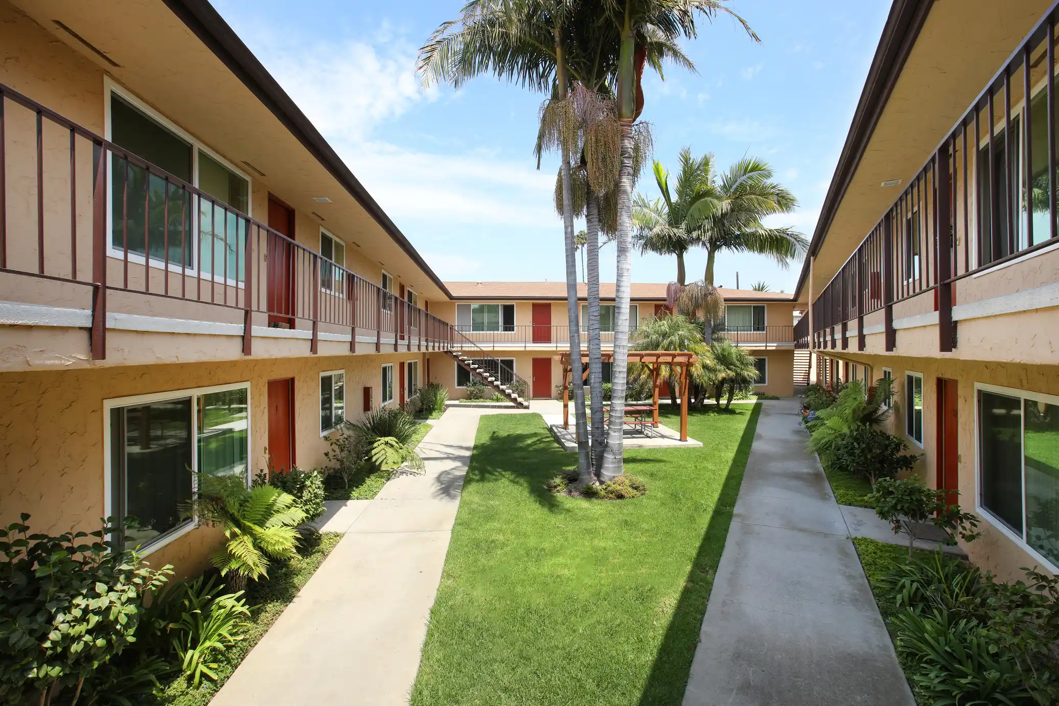Armada Apartments spacious resident courtyard with picnic seating